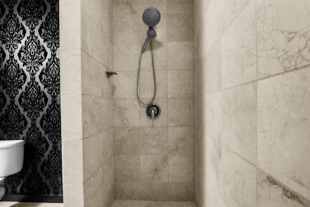 1200 Main St Unit 1511, Dallas, TX 75202 - bathroom featuring toilet and tiled shower