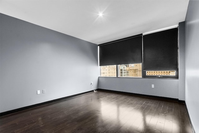 1200 Main St Unit 1511, Dallas, TX 75202 - unfurnished room featuring baseboards and wood finished floors