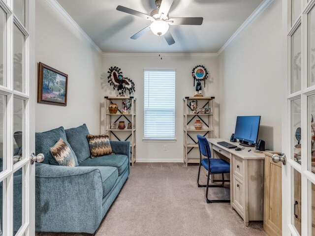 home office featuring crown molding, light carpet, french doors, a ceiling fan, and baseboards