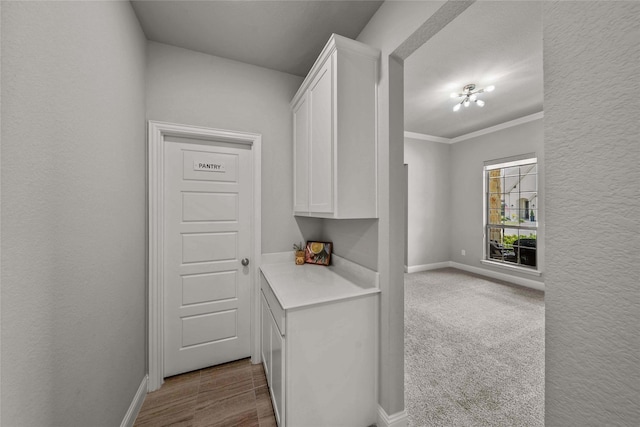 12756 Aspen Springs Ln, Fort Worth, TX 76052 - interior space featuring baseboards, a textured wall, ornamental molding, and carpet flooring