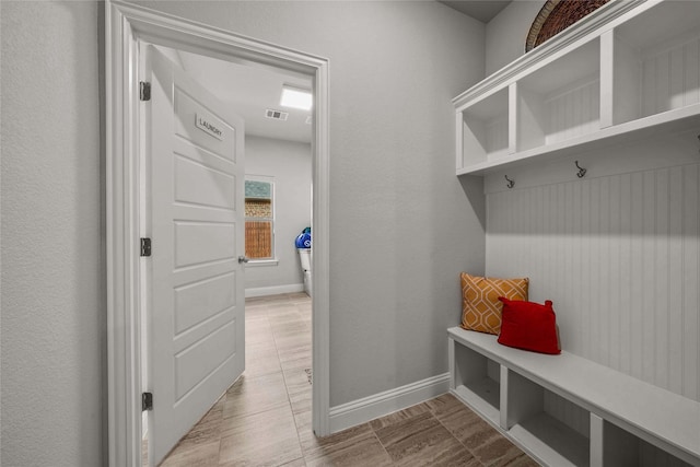 12756 Aspen Springs Ln, Fort Worth, TX 76052 - mudroom featuring baseboards and visible vents