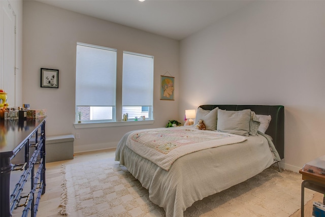 bedroom featuring baseboards