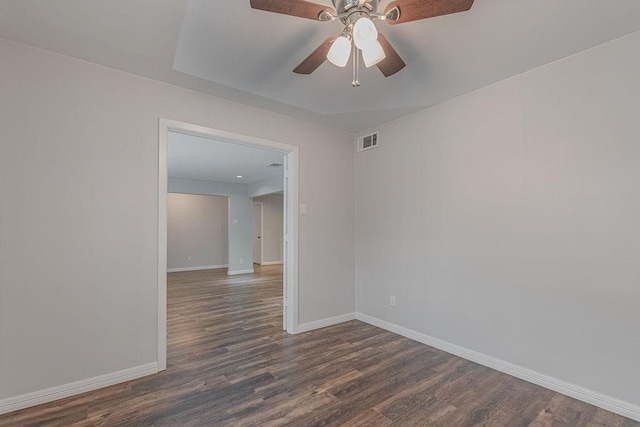 3336 Whitehall Dr, Dallas, TX 75229 - empty room featuring baseboards, dark wood-type flooring, and ceiling fan