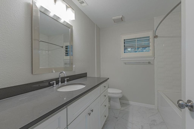 3336 Whitehall Dr, Dallas, TX 75229 - bathroom with vanity, marble finish flooring, toilet, and washtub / shower combination