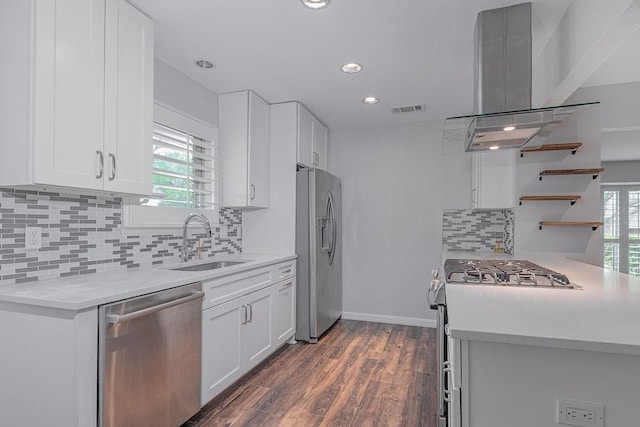 3336 Whitehall Dr, Dallas, TX 75229 - kitchen featuring stainless steel appliances, wall chimney range hood, a sink, white cabinetry, and recessed lighting