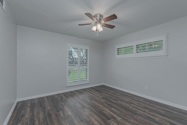 3336 Whitehall Dr, Dallas, TX 75229 - empty room with dark wood-type flooring, baseboards, and a ceiling fan