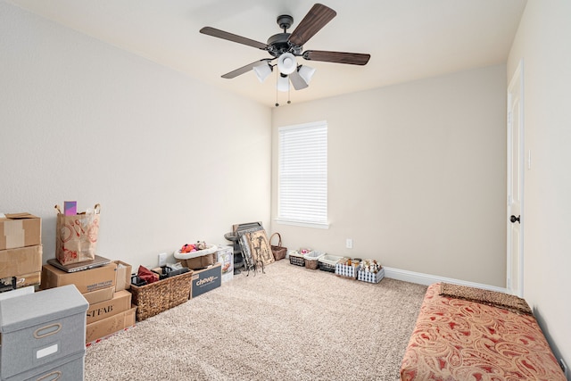 game room featuring baseboards, carpet flooring, and ceiling fan