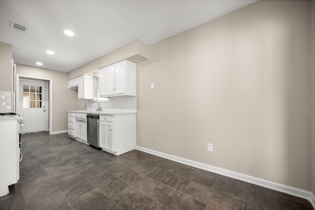 kitchen with dishwasher, baseboards, tasteful backsplash, and visible vents