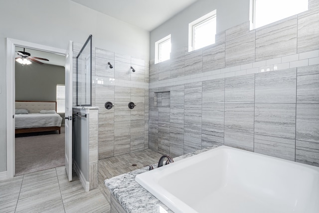ensuite bathroom featuring a bath, ensuite bathroom, a tile shower, and ceiling fan