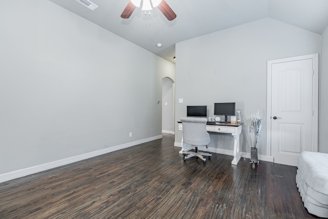 office area featuring baseboards, wood finished floors, a ceiling fan, arched walkways, and lofted ceiling