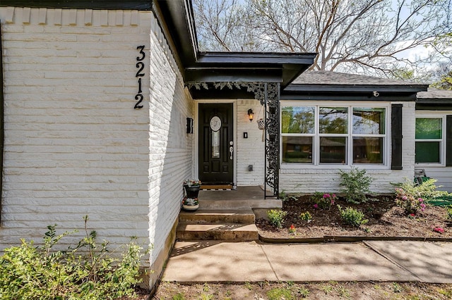 3212 San Marcus Ave, Dallas, TX 75228 - view of exterior entry featuring brick siding