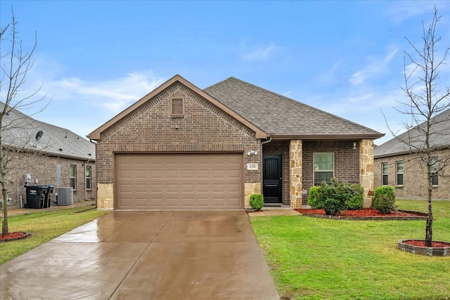 view of front of property featuring brick siding, roof with shingles, central AC unit, and a front lawn
