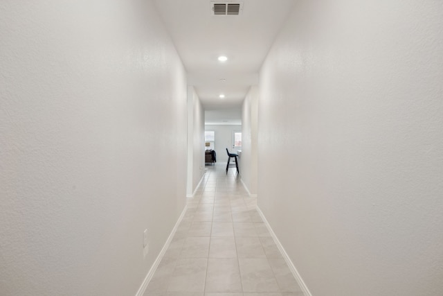 2728 Starwater Dr, Fort Worth, TX 76179 - corridor featuring baseboards, visible vents, recessed lighting, and light tile patterned floors