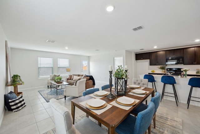 2728 Starwater Dr, Fort Worth, TX 76179 - dining space with light tile patterned flooring, baseboards, visible vents, and recessed lighting