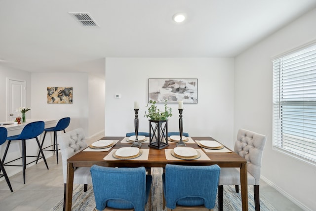 2728 Starwater Dr, Fort Worth, TX 76179 - dining area featuring light tile patterned flooring, baseboards, and visible vents