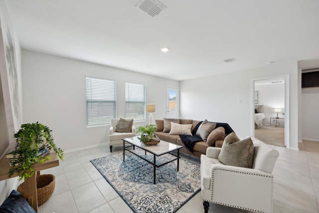 2728 Starwater Dr, Fort Worth, TX 76179 - living area featuring baseboards, visible vents, and light tile patterned floors