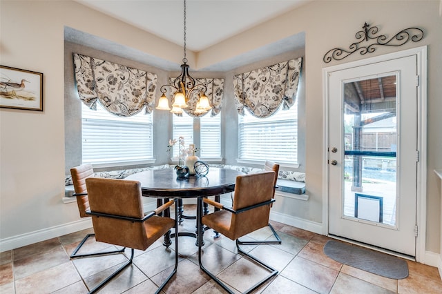 1179 Marquette Dr, Frisco, TX 75033 - dining area featuring a chandelier, plenty of natural light, baseboards, and light tile patterned floors