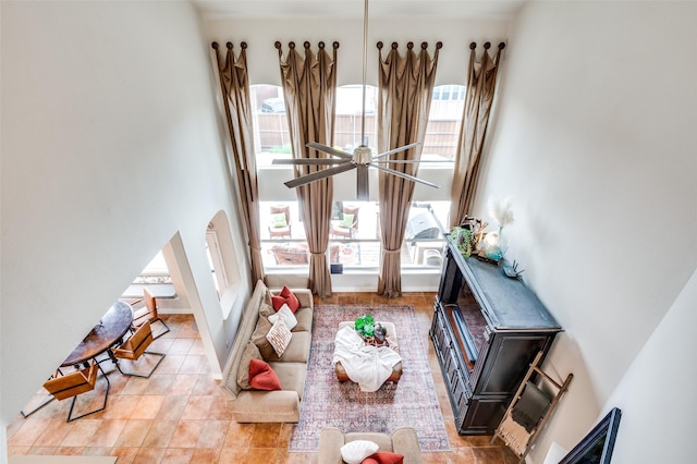 1179 Marquette Dr, Frisco, TX 75033 - tiled living room with a high ceiling