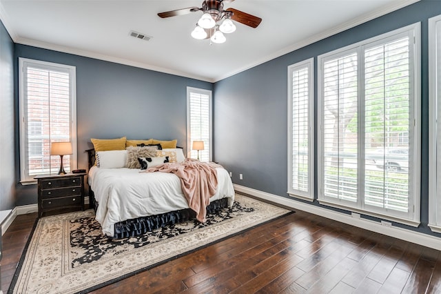 1179 Marquette Dr, Frisco, TX 75033 - bedroom featuring baseboards, dark wood-style floors, ornamental molding, and a ceiling fan