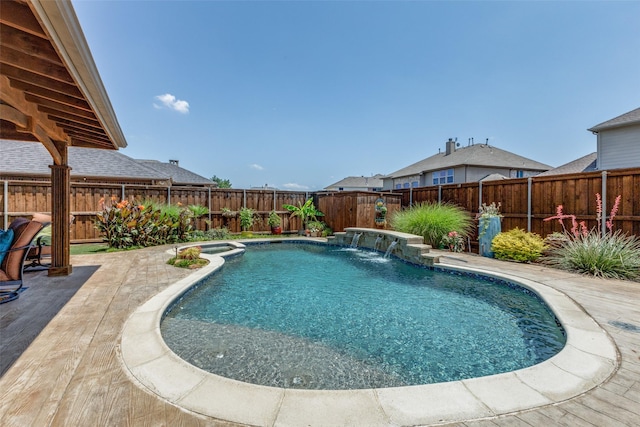 1179 Marquette Dr, Frisco, TX 75033 - view of swimming pool featuring a patio area, a pool with connected hot tub, and a fenced backyard