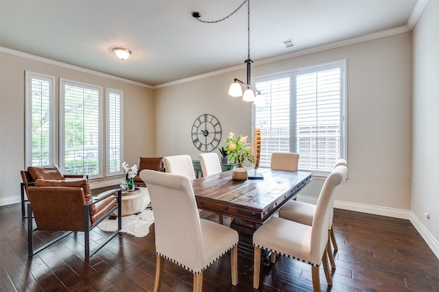 1179 Marquette Dr, Frisco, TX 75033 - dining area with baseboards, dark wood finished floors, plenty of natural light, and ornamental molding