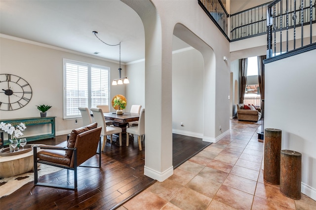 1179 Marquette Dr, Frisco, TX 75033 - entrance foyer with baseboards, arched walkways, and ornamental molding