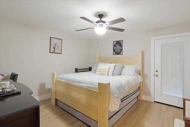 bedroom with baseboards, light wood-type flooring, and ceiling fan