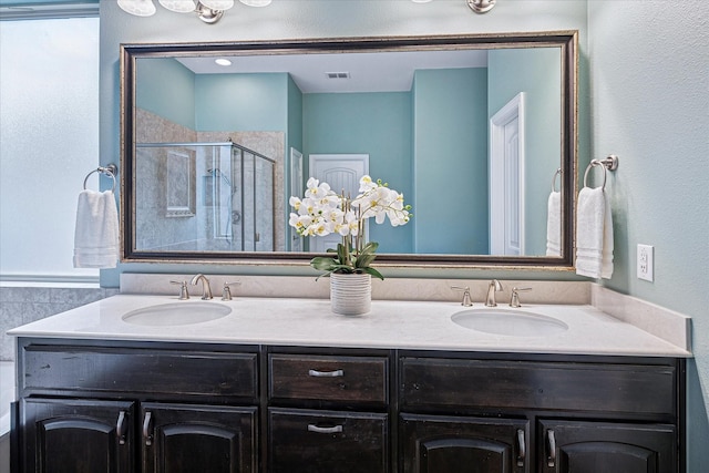 208 Equestrian Ln, Hickory Creek, TX 75065 - full bathroom featuring double vanity and a shower stall