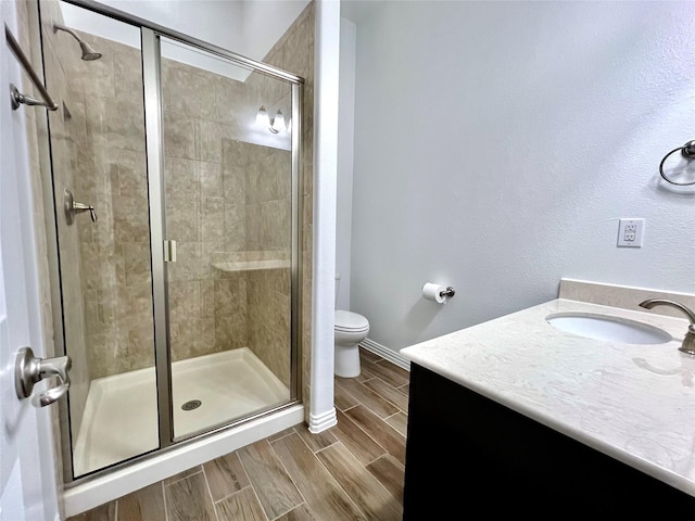 208 Equestrian Ln, Hickory Creek, TX 75065 - full bathroom with vanity, a shower stall, and wood finish floors