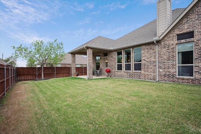 208 Equestrian Ln, Hickory Creek, TX 75065 - fenced backyard featuring a patio area