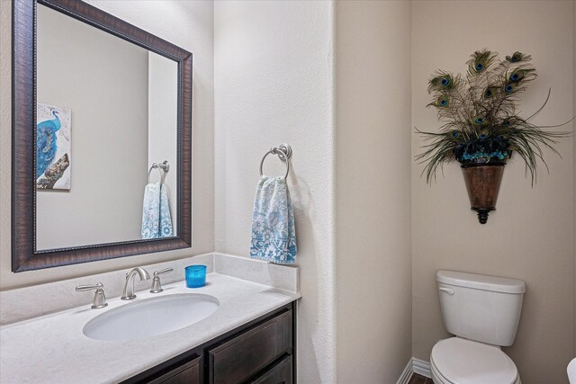 208 Equestrian Ln, Hickory Creek, TX 75065 - bathroom featuring toilet and vanity