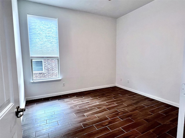 208 Equestrian Ln, Hickory Creek, TX 75065 - empty room with dark wood-style floors and baseboards