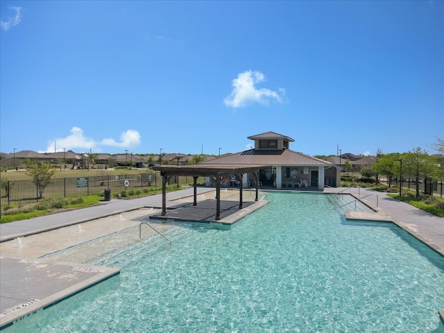 817 Layla Dr, Fate, TX 75087 - community pool featuring a patio area