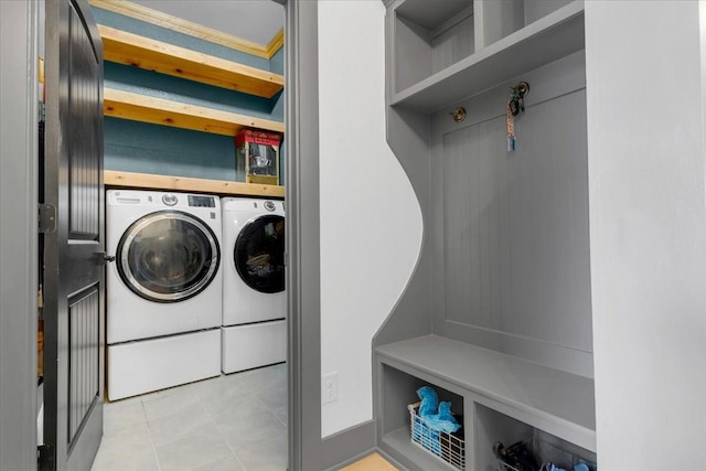 817 Layla Dr, Fate, TX 75087 - laundry room featuring washer and clothes dryer and tile patterned floors