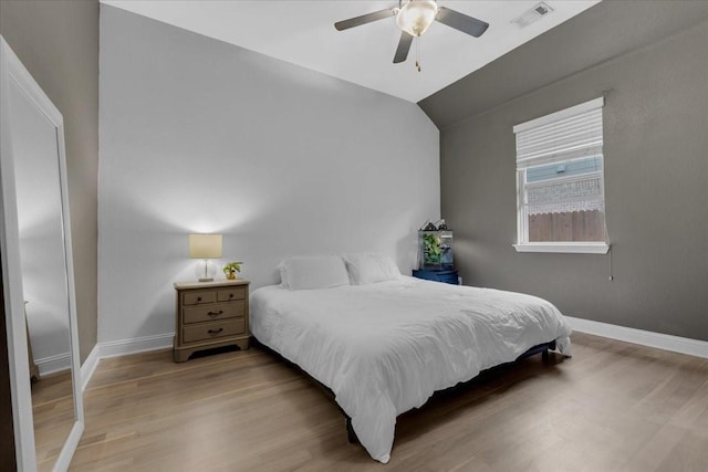 817 Layla Dr, Fate, TX 75087 - bedroom with wood finished floors, baseboards, vaulted ceiling, and a ceiling fan