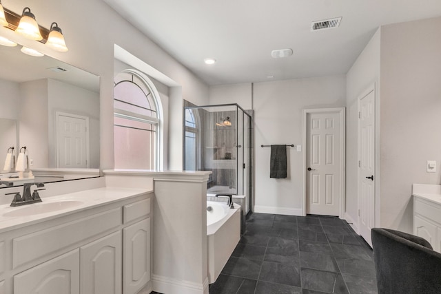 6417 Belhaven Dr, Fort Worth, TX 76123 - bathroom with a stall shower, visible vents, a bath, a sink, and two vanities