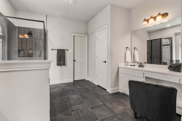 6417 Belhaven Dr, Fort Worth, TX 76123 - bathroom with baseboards, tile patterned floors, vanity, and a walk in shower
