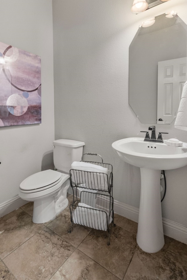6417 Belhaven Dr, Fort Worth, TX 76123 - bathroom featuring toilet and baseboards