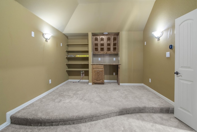 6417 Belhaven Dr, Fort Worth, TX 76123 - unfurnished living room featuring light colored carpet, lofted ceiling, and baseboards