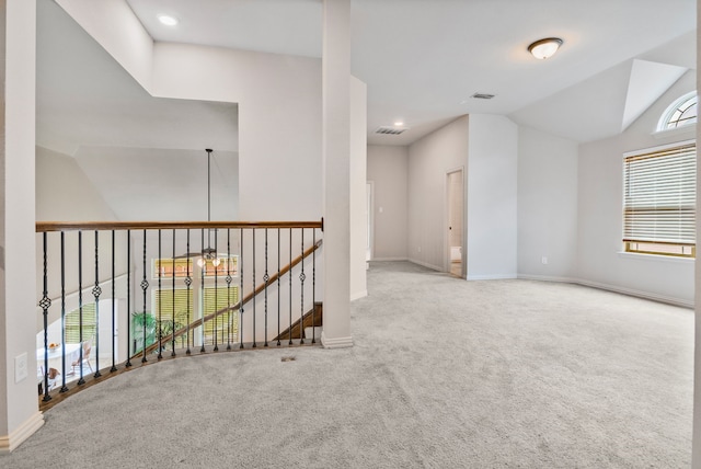 6417 Belhaven Dr, Fort Worth, TX 76123 - carpeted empty room with vaulted ceiling, baseboards, visible vents, and recessed lighting