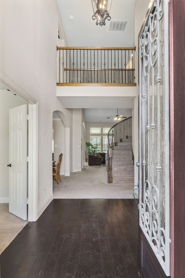 6417 Belhaven Dr, Fort Worth, TX 76123 - foyer entrance featuring stairway, a high ceiling, baseboards, and visible vents