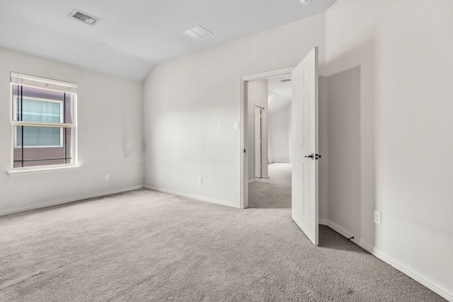 6417 Belhaven Dr, Fort Worth, TX 76123 - spare room with lofted ceiling, carpet, baseboards, and visible vents