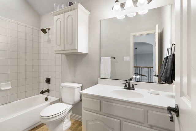 6417 Belhaven Dr, Fort Worth, TX 76123 - full bath with toilet, baseboards, vanity, and shower / washtub combination