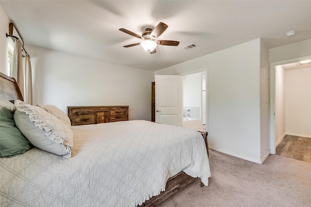 207 Shady Oaks Dr, Runaway Bay, TX 76426 - carpeted bedroom with visible vents, baseboards, connected bathroom, and ceiling fan