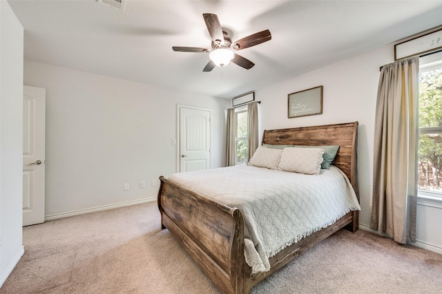207 Shady Oaks Dr, Runaway Bay, TX 76426 - bedroom featuring visible vents, baseboards, a ceiling fan, and carpet flooring