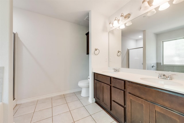207 Shady Oaks Dr, Runaway Bay, TX 76426 - full bath featuring toilet, a sink, a stall shower, double vanity, and tile patterned floors