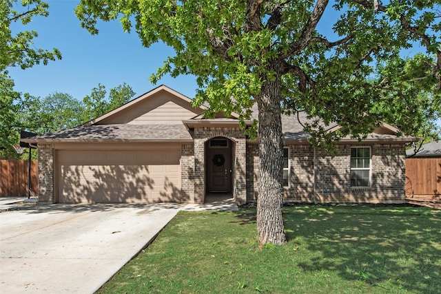 207 Shady Oaks Dr, Runaway Bay, TX 76426 - single story home featuring a garage, roof with shingles, fence, a front lawn, and concrete driveway