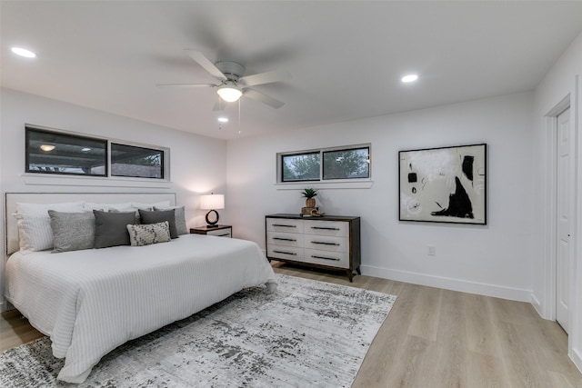 10606 Estate Ln, Dallas, TX 75238 - bedroom with wood finished floors, baseboards, recessed lighting, and a ceiling fan