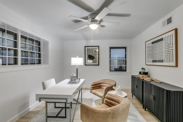 10606 Estate Ln, Dallas, TX 75238 - office with ceiling fan, light wood-style flooring, and baseboards