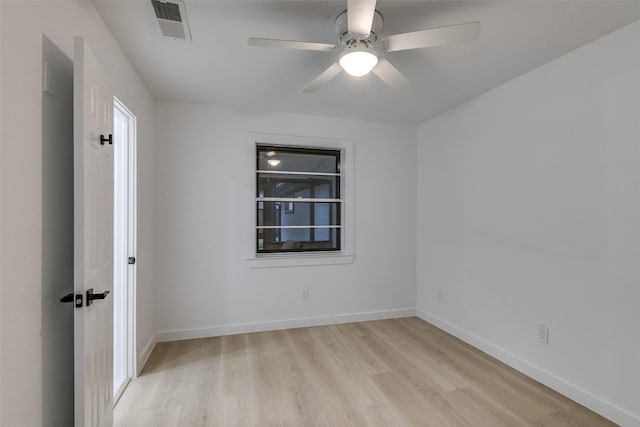 10606 Estate Ln, Dallas, TX 75238 - spare room featuring light wood-style floors, baseboards, and ceiling fan